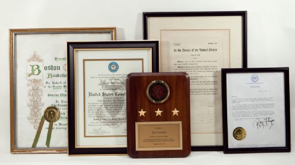 LOT OF FIVE AWARDS PRESENTED TO RED AUERBACH