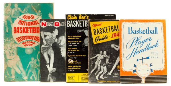 RED AUERBACHS PERSONAL COLLECTION OF (5) EARLY BASKETBALL HANDBOOKS AND GUIDES