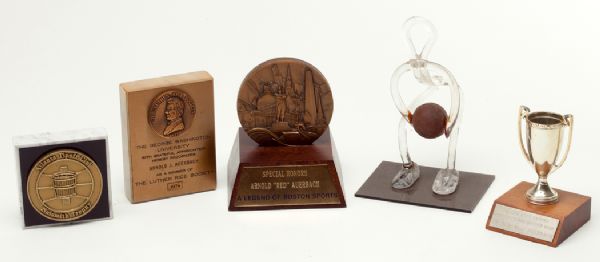 LOT OF FIVE SMALL AWARDS PRESENTED TO RED AUERBACH