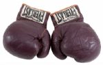 MUHAMMAD ALIS FIGHT-WORN GLOVES FROM 1966 BOUT VS. GEORGE CHUVALO