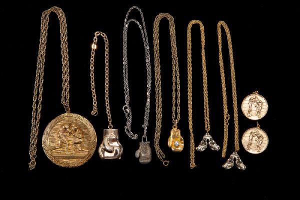 ANGELO DUNDEES COLLECTION OF (8) BOXING NECKLACES AND MEDALLIONS