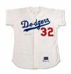 1965 SANDY KOUFAX AUTOGRAPHED LOS ANGELES DODGERS (WORLD CHAMPIONSHIP AND CY YOUNG SEASON) GAME WORN HOME JERSEY (MEARS A9.5, NSM COLLECTION)