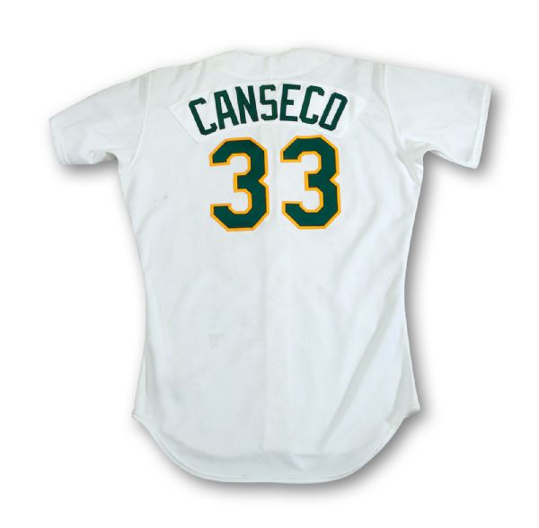 1988 JOSE CANSECO SIGNED OAKLAND AS GAME WORN HOME JERSEY WITH INSCRIPTION "GAMER, 40/40 SEASON, 88 MVP" (CANSECO LOA & MEARS A10)