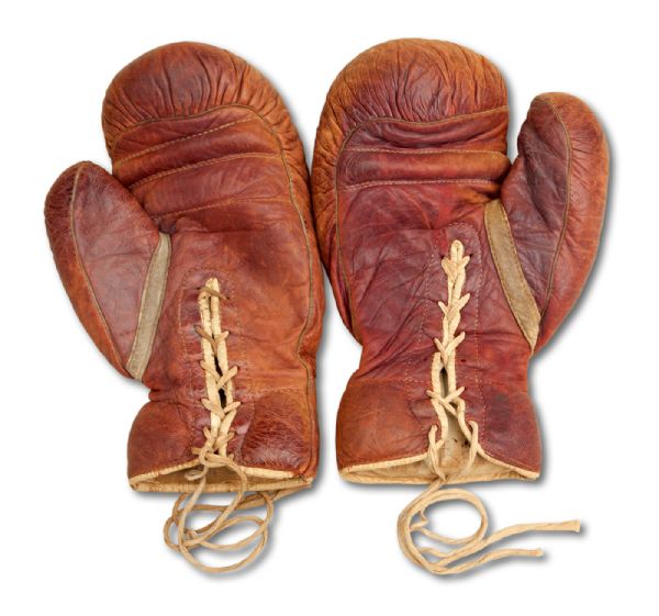 JACK DEMPSEYS AUTOGRAPHED FIGHT WORN BOXING GLOVES USED IN 1927 HEAVYWEIGHT BOUT VS. JACK SHARKEY (HELMS/LA84 COLLECTION)