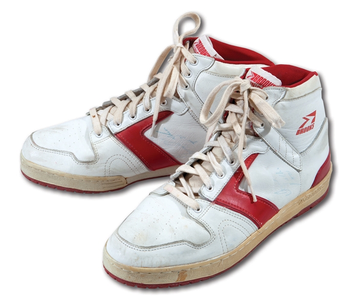 1985-86 DOMINIQUE WILKINS DUAL-SIGNED PAIR OF BROOKS GAME WORN SHOES (HAWKS BALL BOY LOA)
