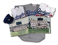 DON DRYSDALES MID 1980S - EARLY 1990S DODGERS OLD TIMERS GROUP OF (3) GAME WORN JERSEYS, (1) GAME WORN CAP AND (2) TEAM PHOTOS (DRYSDALE COLLECTION)