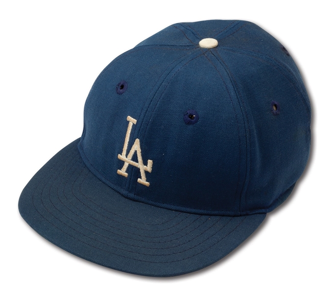 1960-65 SANDY KOUFAX ATTRIBUTED GAME WORN LOS ANGELES DODGERS CAP WITH PROTECTIVE INSERT (MEARS LOA, HELMS MUSEUM PROVENANCE)