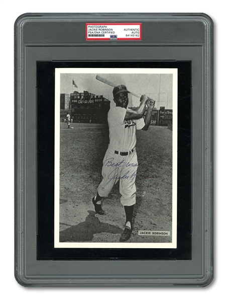 JACKIE ROBINSON AUTOGRAPHED BROOKLYN DODGERS PHOTO INSCRIBED "BEST WISHES" (PSA/DNA AUTH.)