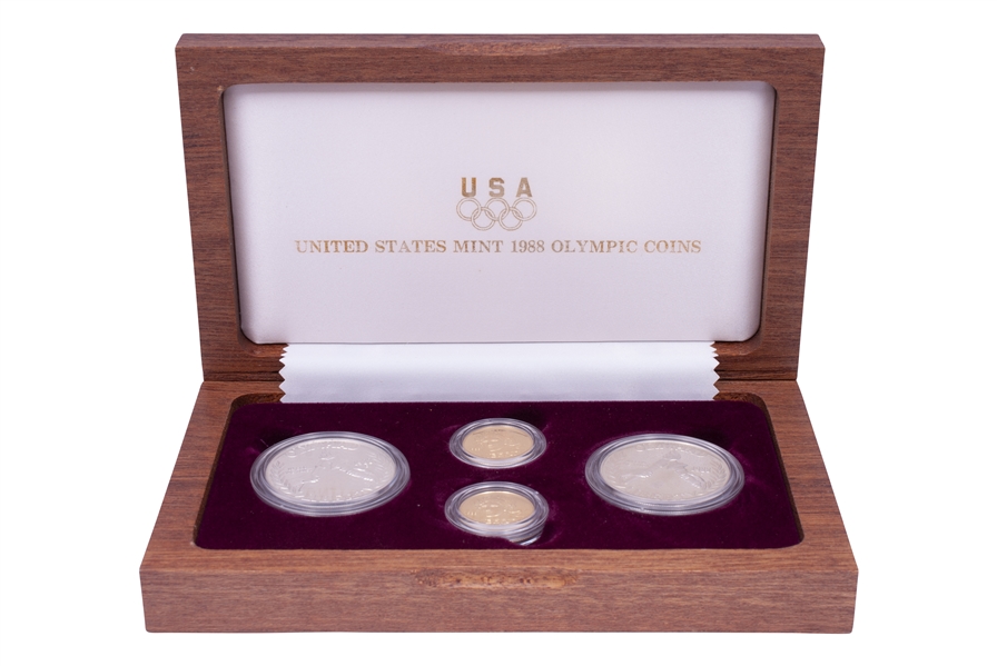1988 SILVER DOLLAR & GOLD FIVE DOLLAR UNITED STATES OLYMPIC COINS MAHOGANY FOUR-COIN SET