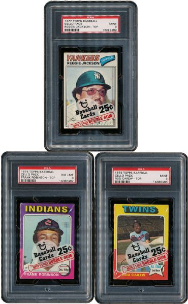 1970S TOPPS BASEBALL LOT OF 3 UNOPENED CELLO PACKS WITH STARS SHOWING 1975 MINT PSA 9, 1977 MINT PSA 9, 1975 NM-MT 8