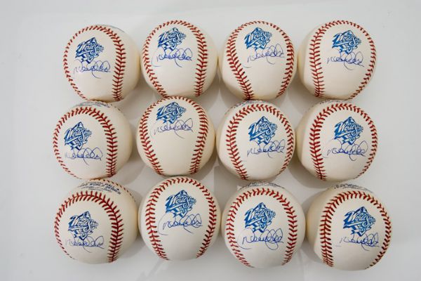 One Dozen Derek Jeter Single Signed 1999 World Series Baseballs 