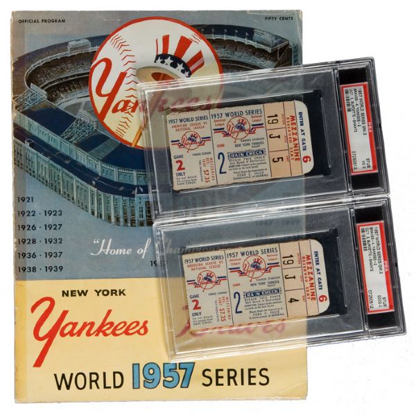 1957 WORLD SERIES PROGRAM (YANKEES/BRAVES) WITH PAIR OF PSA GRADED STUBS TO GAME 2
