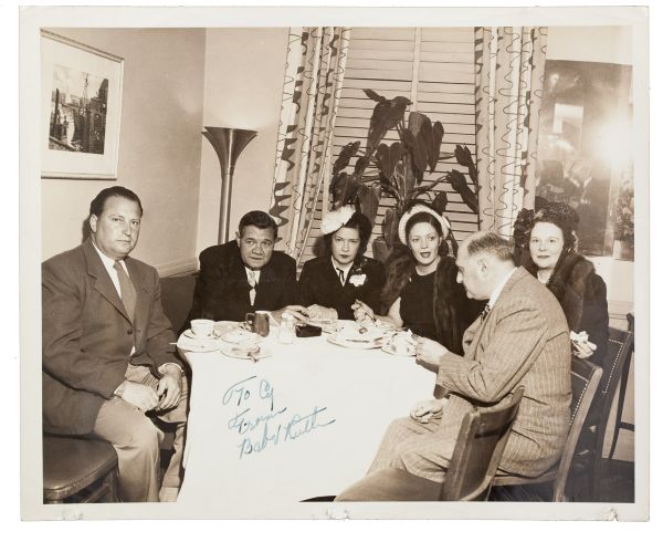 BABE RUTH SIGNED 8" BY 10" PHOTO (HAVING DINNER WITH CY JONES)