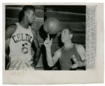 BILL RUSSELL SIGNED WIRE PHOTO INSCRIBED TO RED AUERBACH