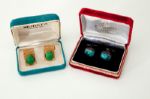 TWO PAIRS OF RED AUERBACH CUFF LINKS 