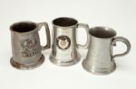 THREE PEWTER MUGS FROM THE RED AUERBACH ESTATE 