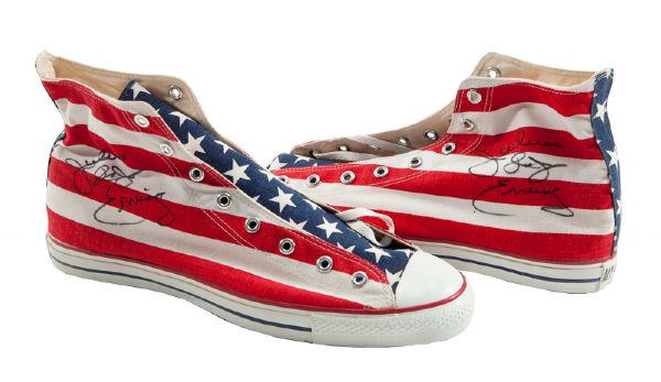 JULIUS "DR. J" ERVINGS SIGNED CUSTOM MADE CONVERSE PAIR OF RED, WHITE, AND BLUE SHOES IN HIS SIZE