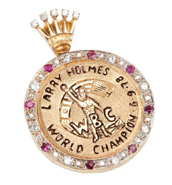 LARRY HOLMES 1978 WBC WORLD CHAMPION GOLD AND DIAMOND PENDANT