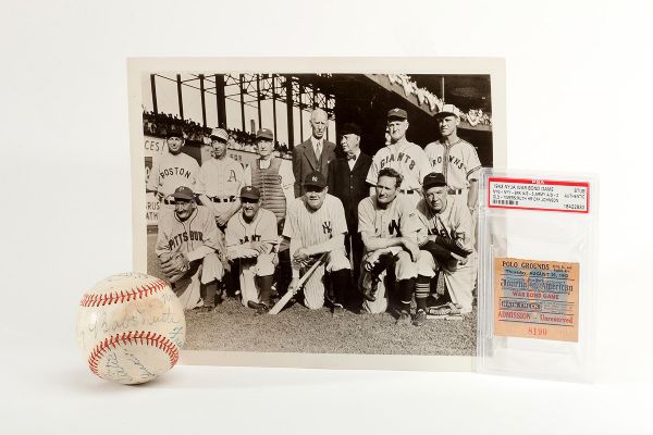 1943 "WAR BOND" HALL OF FAMERS AND STARS MULTI SIGNED BASEBALL INCL. RUTH, JOHNSON, WAGNER, SPEAKER AND COLLINS PLUS TEAM PHOTO (PSA/DNA TYPE 1) AND RARE TICKET STUB