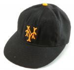BOBBY THOMSONS 1951 NEW YORK GIANTS CAP WORN TO HIT "THE SHOT HEARD ROUND THE WORLD" (IMPECCABLE PHOTO PROVENANCE) -EX NATIONAL BASEBALL HALL OF FAME