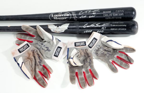 2010 CARLOS SANTANA LOT OF (2) GAME USED BATS AND (2) GAME USED GLOVES