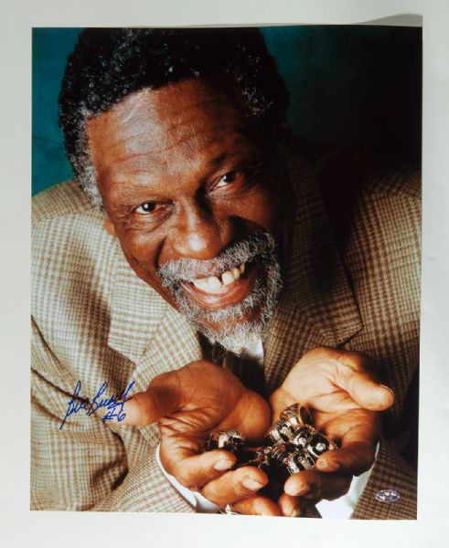 BILL RUSSELL SIGNED 16 X 20 PHOTO HOLDING HIS 11 CHAMPIONSHIP RINGS