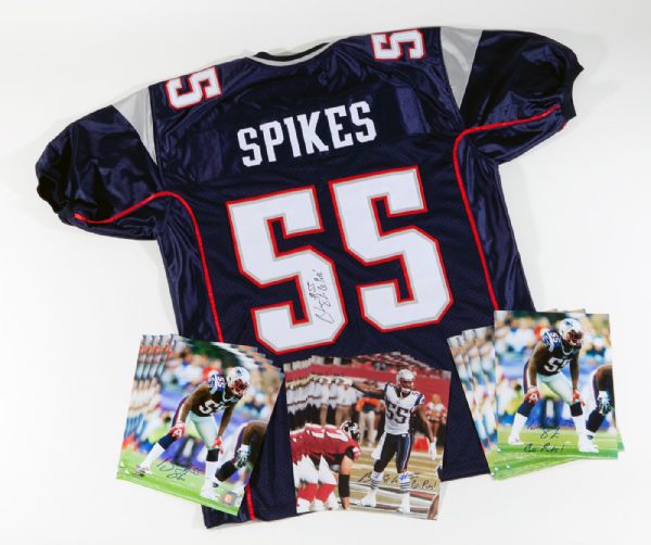 BRANDON SPIKES LOT OF (1) SIGNED JERSEY AND (20) 8 X 10 PHOTOS