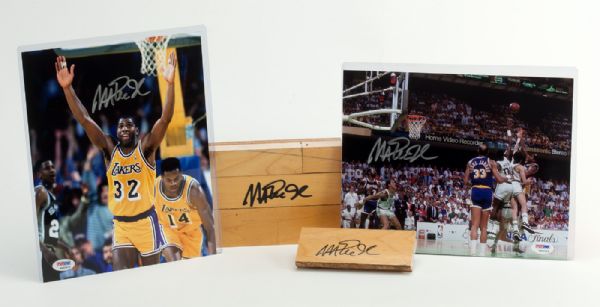 LOT OF (4) MAGIC JOHNSON SIGNED PHOTOS AND FORUM FLOOR PIECES