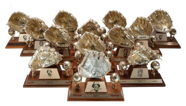 OZZIE SMITH’S CAREER SET OF 13 CONSECUTIVE (NATIONAL LEAGUE RECORD) GOLD GLOVE AWARD TROPHIES - (1980-92)