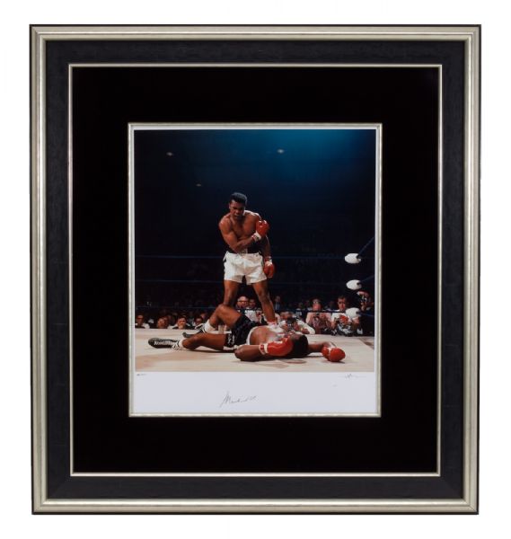 THE MOST FAMOUS PHOTOGRAPH OF MUHAMMAD ALI, TOWERING TRIUMPHANTLY OVER SONNY LISTON - ONE OF ONLY 350 SIGNED BY BOTH ALI AND PHOTOGRAPHER NEIL LEIFER