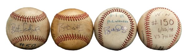 BRET SABERHAGENS INSCRIBED GAME USED BASEBALLS FROM HIS MILESTONE 20TH, 50TH, 100TH AND 150TH MAJOR LEAGUE WINS (SABERHAGEN LOA) 