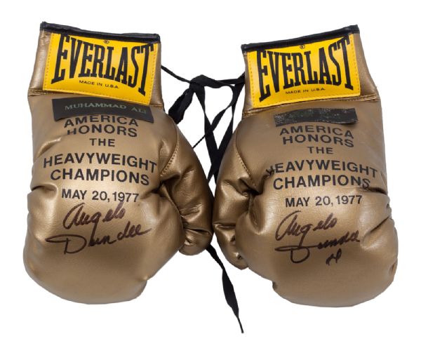 ANGELO DUNDEES 1977 EVERLAST GOLD BOXING GLOVES COMMEMORATING HEAVYWEIGHT CHAMPIONS MUHAMMAD ALI AND JIMMY ELLIS AUTOGRAPHED BY DUNDEE