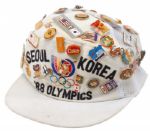 ANGELO DUNDEES 1988 SEOUL KOREA OLYMPICS CAP WITH MORE THAN 80 SOUVENIR PINS