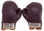 MUHAMMAD ALIS FIGHT-WORN GLOVES FROM 1972 BOUT VS. FLOYD PATTERSON