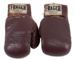 CASSIUS CLAYS FIGHT-WORN GLOVES FROM HIS HISTORIC FEBRUARY 25, 1964 BOUT VS. SONNY LISTON