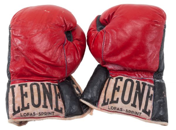 JOSE NAPOLES FIGHT-WORN GLOVES FROM HIS 1973 HEAVYWEIGHT TITLE BOUT VS. ROGER MCNETREY