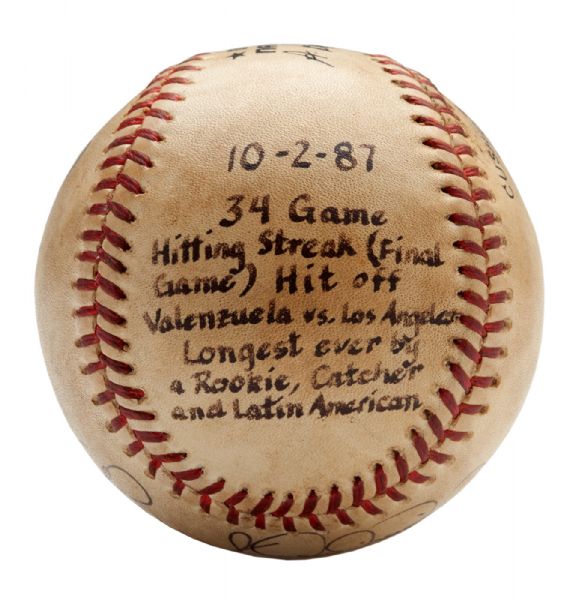 BENITO SANTIAGOS 1987 GAME USED AND SIGNED OLB (GIAMATTI) BASEBALL FROM MLB ROOKIE RECORD 34 GAME HITTING STREAK (SANTIAGO LOA)
