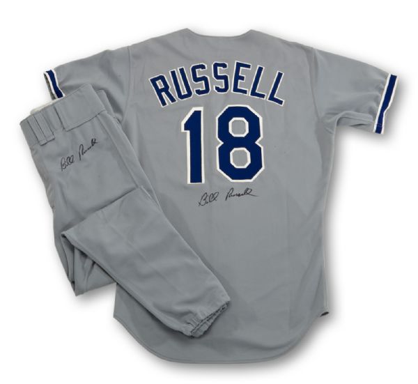 BILL RUSSELLS 1988 (WORLD CHAMPIONSHIP YEAR) LOS ANGELES DODGERS GAME WORN AND SIGNED ROAD JERSEY AND PANTS (RUSSELL LOA)