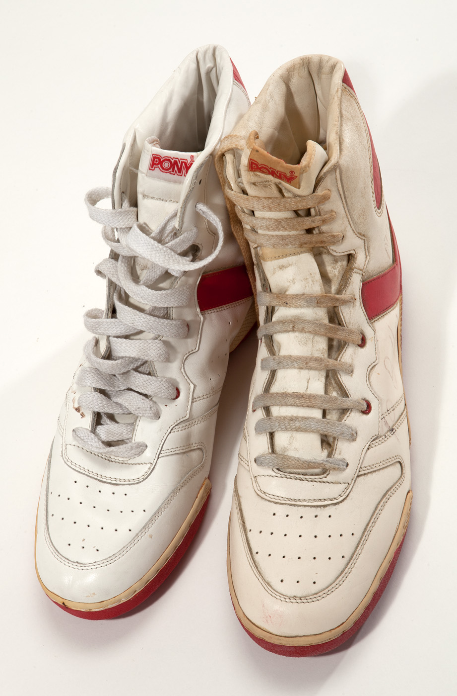 Lot Detail - HAKEEM OLAJUWON GAME WORN AND SIGNED CONVERSE CONS
