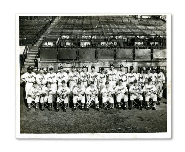 RARE AND IMPORTANT 1946 MONTREAL ROYALS TEAM SIGNED PHOTOGRAPH INCL. PRE-ROOKIE JACKIE ROBINSON ONE YEAR BEFORE BREAKING BASEBALLS COLOR BARRIER 