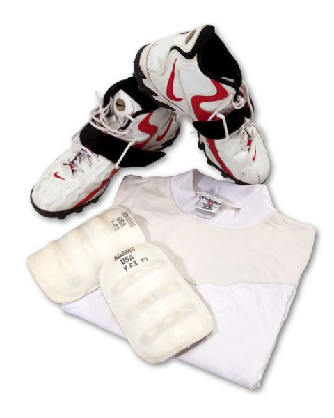 WARREN MOONS 1999-2000 KANSAS CITY CHIEFS GAME WORN ITEMS FROM HIS FINAL TWO NFL SEASONS INCLUDING: NIKE CLEATS, ADAMS THIGH PADS, AND REEBOK LONG-SLEEVE ATHLETIC UNDERSHIRT (MOON LOA)
