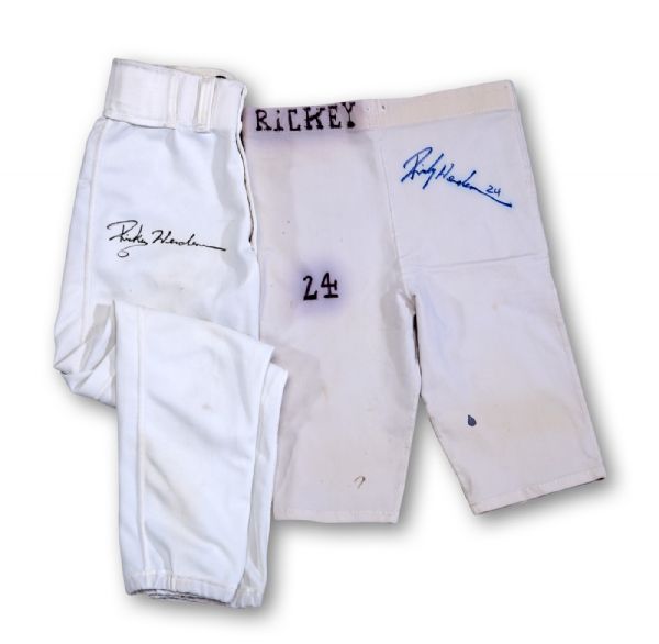 1990 RICKEY HENDERSON SIGNED OAKLAND AS GAME-WORN HOME PANTS USED DURING HIS ONLY MVP SEASON AND 1995 GAME-WORN & SIGNED SLIDING SHORTS