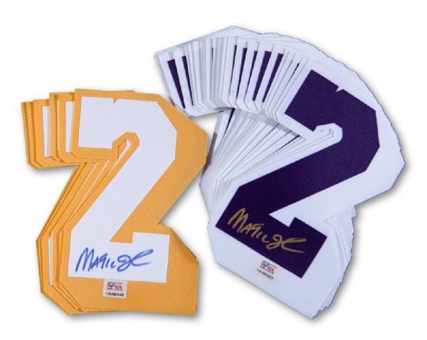 MAGIC JOHNSON SIGNED LOT OF 31 NUMBER "2"S, 25 PURPLE ON WHITE AND 6 WHITE ON GOLD WITH INDIVIDUAL PSA/DNA COAS