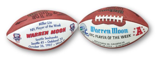 WARREN MOONS 10/26/1997 SIGNED SEATTLE SEAHAWKS VS. OAKLAND RAIDERS AFC PLAYER OF THE WEEK GAME BALL AND SIGNED MILLER LITE NFL PLAYER OF THE WEEK AWARD BALL (MOON LOA)