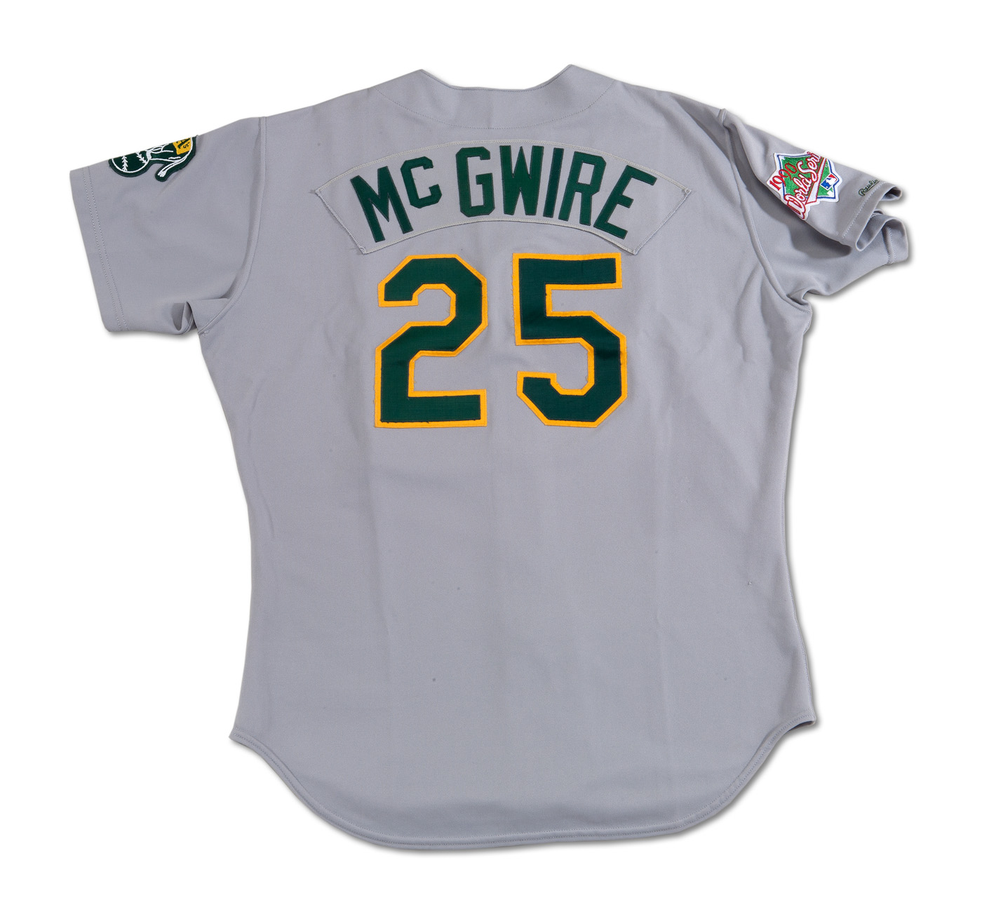Lot Detail - 1990 WORLD SERIES MARK MCGWIRE OAKLAND ATHLETICS GAME WORN  ROAD JERSEY (A'S COA, DELBERT MICKEL COLLECTION)