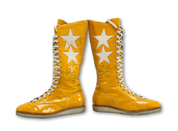 RANDY SAVAGE MATCH WORN AND AUTOGRAPHED YELLOW WRESTLING BOOTS INSCRIBED "MACHO MAN" (FICKE LOA)