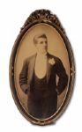 JIM CORBETT FRAMED PORTRAIT PHOTOGRAPH (PARTIAL SIGNATURE) AND PAIR OF ENGRAVED LAMBS CLUB N.Y. IDENTIFICATION TAGS (HELMS/LA84 COLLECTION) 
