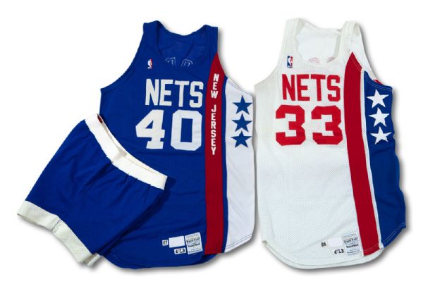 1987-88 TIM MCCORMICK NEW JERSEY NETS GAME WORN ROAD UNIFORM AND 1986-87 LEON WOOD NEW JERSEY NETS GAME WORN HOME JERSEY (TENNEN COLLECTION)