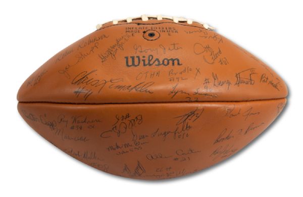 1974 USC TROJANS (NATIONAL CHAMPIONS/ROSE BOWL CHAMPIONS) TEAM SIGNED FOOTBALL (NSM COLLECTION)