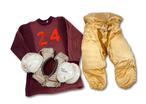1939-40 AMBROSE "AMBIE" SCHINDLER AUTOGRAPHED USC TROJANS GAME WORN ENSEMBLE INCL. JERSEY, PANTS AND PADS (SCHINDLER LOA, NSM COLLECTION)